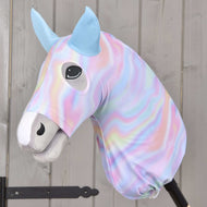 The Hobby Horse LarDen Hobby Horse Protective Suit Rainbow (Lycra) features a plush pastel rainbow-colored cover with blue ears, a smiling face, and button eyes, shown mounted on a stick against light wood.