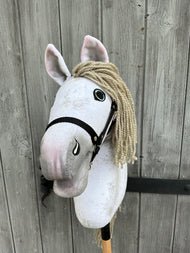The Hobby Horse LarDen "Victory with Black Halter" (size M) features a handmade white plush head, yarn mane, black halter, and expressive eyes on a wooden stick, inspired by Andalusian horses.