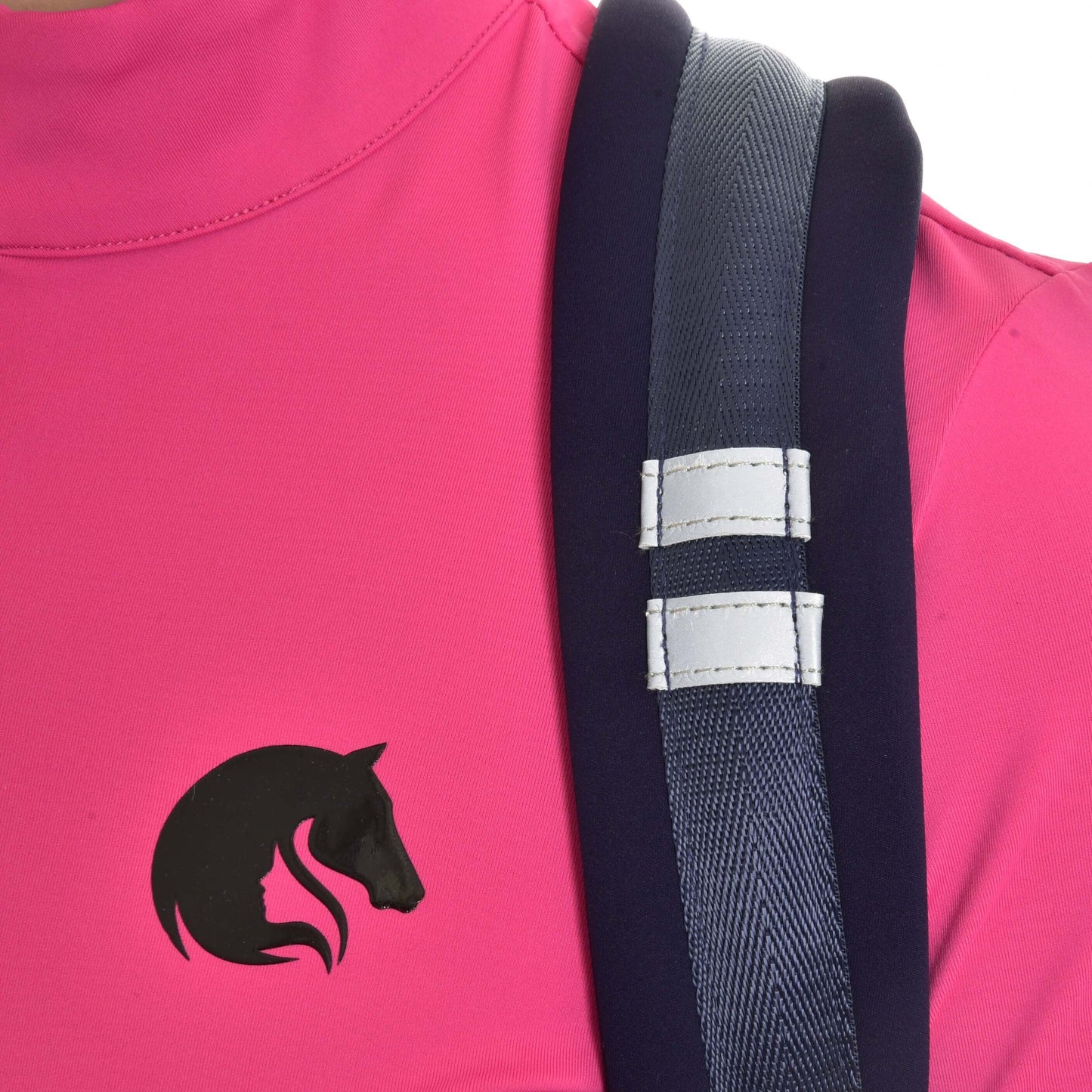 Close-up of a person wearing the Hobby Horse LarDen Backpack, featuring blue neoprene-style padded straps with white stitching and a bright pink top displaying the black Hobby Horse head logo.