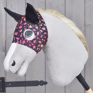 Hobby Horse Horse Mask Roxy by LarDen worn on a grey Hobby Horse with black, pink and orange pattern