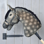 Close profile of Hobby Horse Stormy with Black Halter by Hobby Horse LarDen highlighting the hand-airbrushed dapple grey markings on the neck, black mane and black halter.