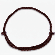 The Cordeo Chocolate by Hobby Horse LarDen is a simple, dark polypropylene rope tied in a circle with two knots on opposite sides, shown against a plain white background.