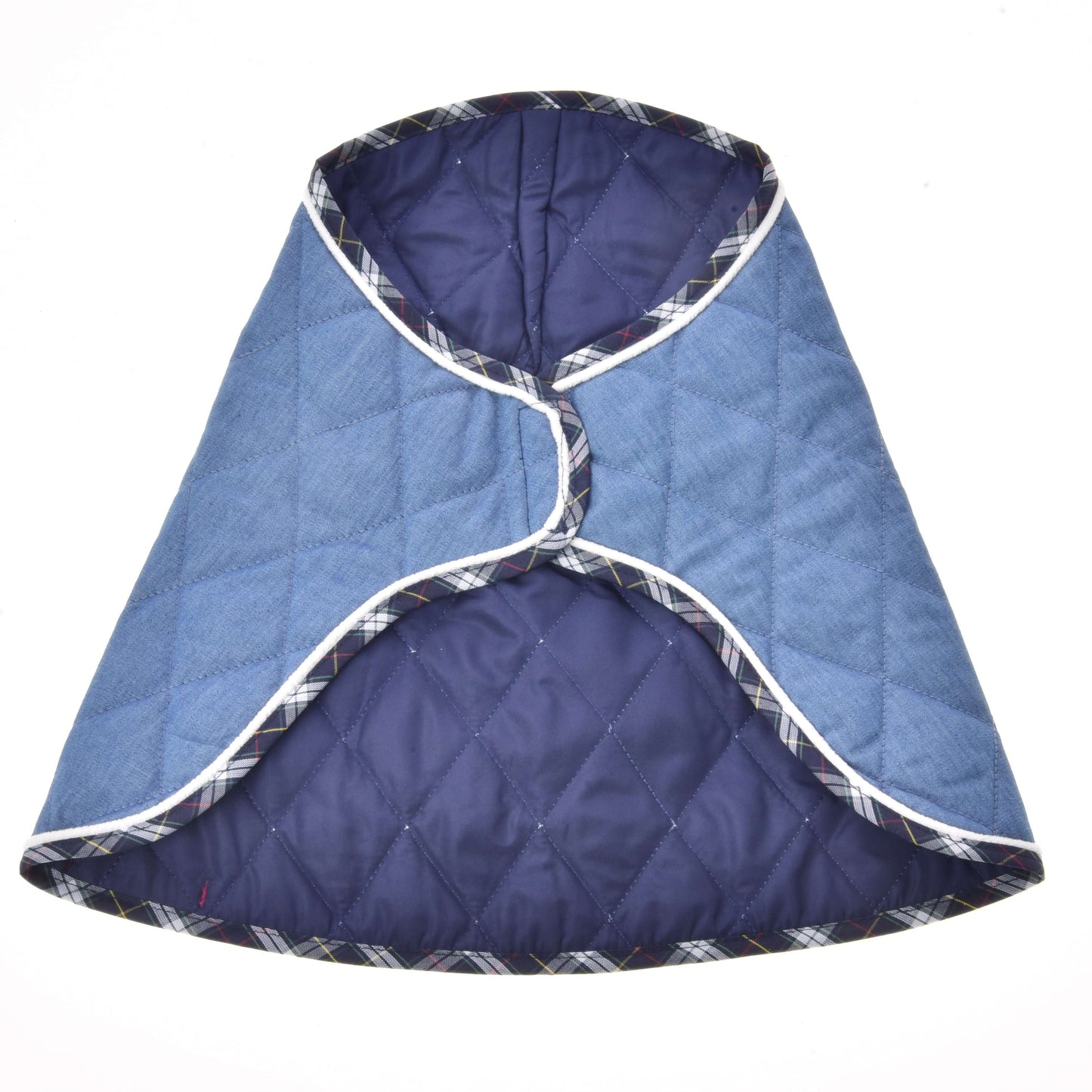The Blanket Beautiful Jeans by Hobby Horse LarDen is a quilted blue and navy pet coat with white trim and plaid edging, featuring a curved, overlapping design and diamond stitching, shown flat on a white background.