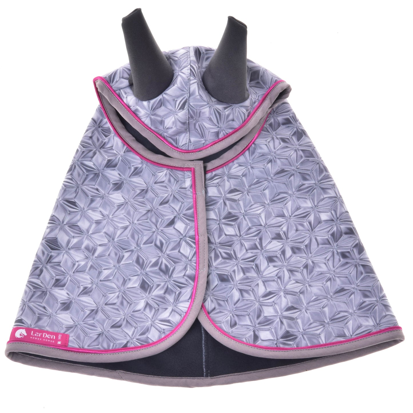 The Raincoat Valentine by Hobby Horse LarDen is a gray quilted dog coat with a geometric pattern, pink trim, ear holes at the top, and a small red label on the bottom left. Laid flat for display.